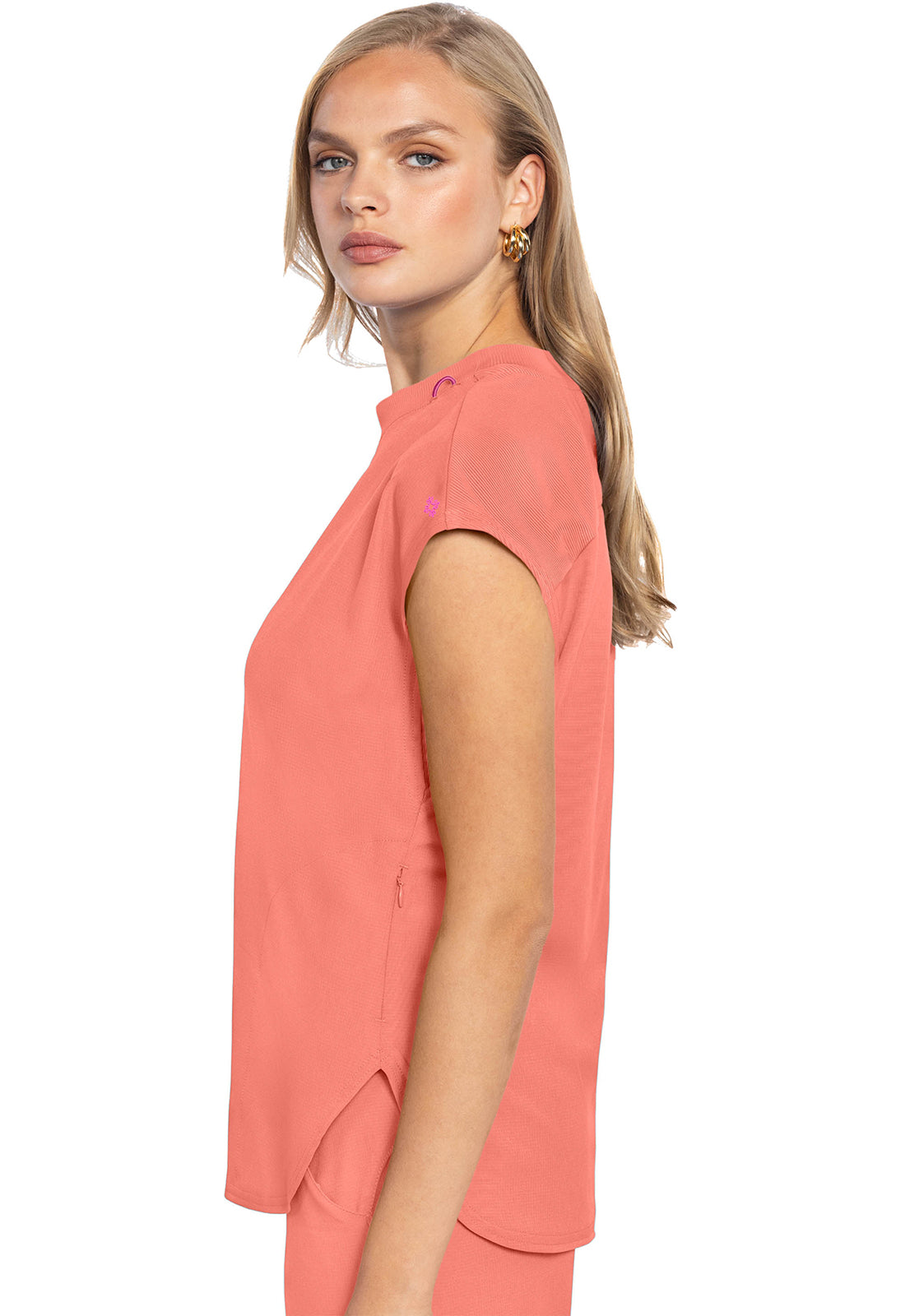 MEDCOUTURE round neck tuckable top in soft fabric, shown on a model with a clean, stylish fit and versatile design.